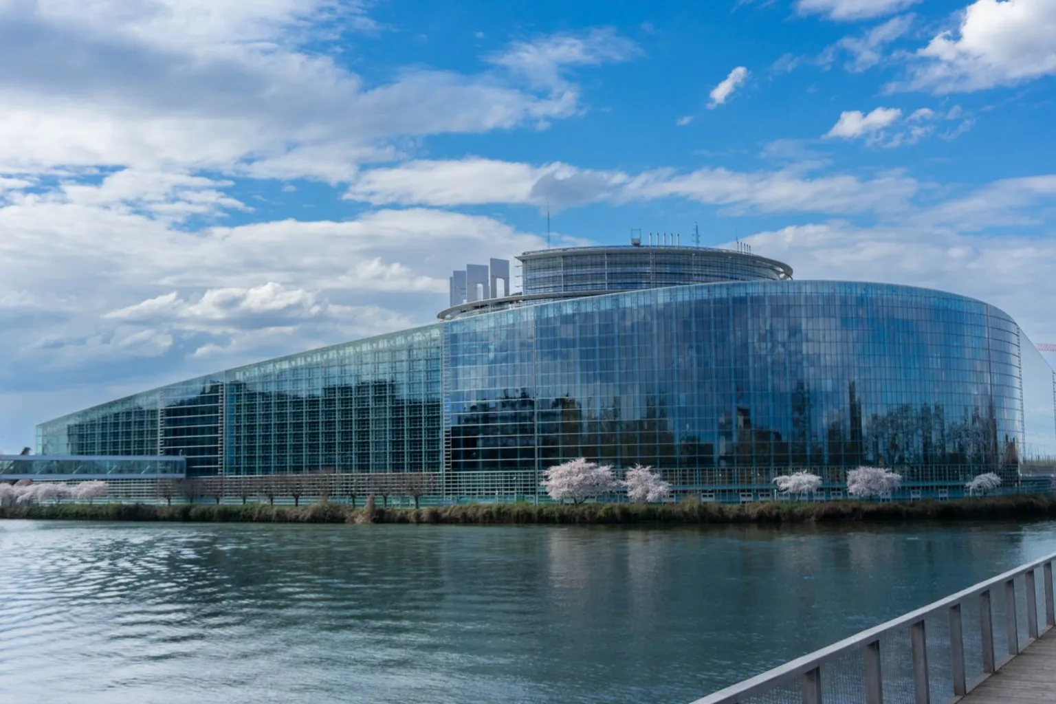 The European Parliament building in Strasbourg with reflective glass facade